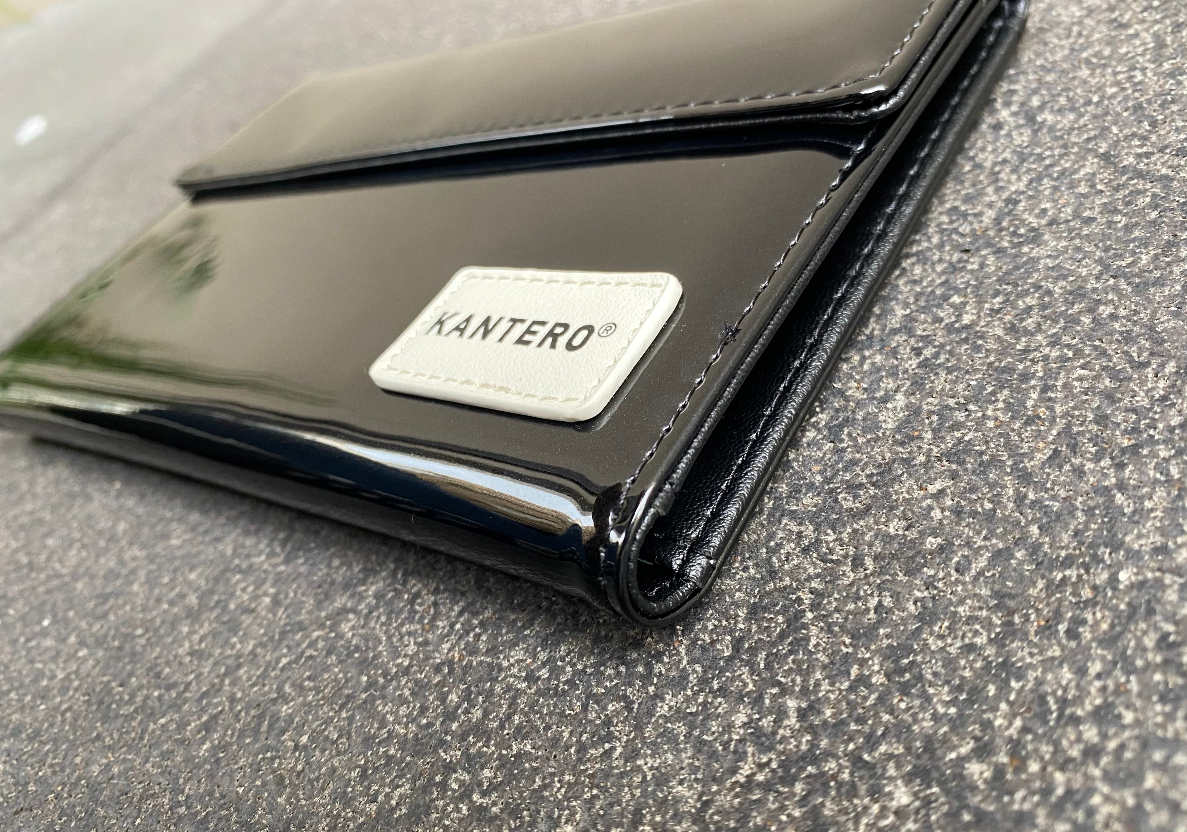 ⁨⁨⁨ארנק בינוני ⁩שחור לקה  ⁩⁩